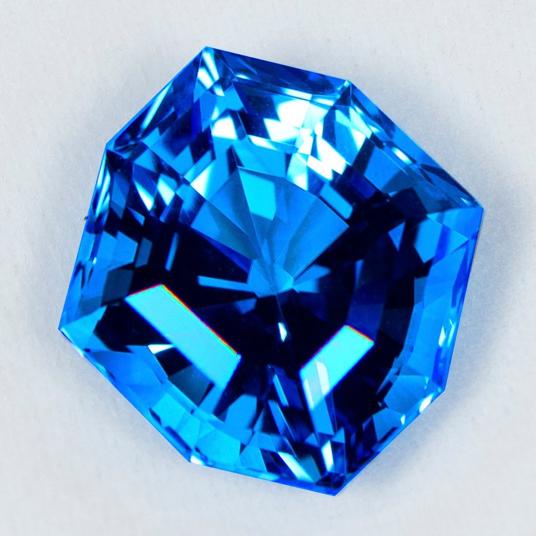 11.84 Cts IGI certified Blue Topaz — original auction photograph